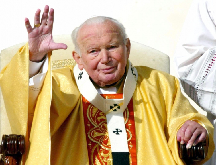 VATICAN POPE :Pope John Paul II greets the crowd as he delights more than 200,000 pilgrims gathered in St. Peter's Square and millions of Catholics worldwide 19 October 2003 by beatifying Mother Teresa of Calcutta, the diminutive nun who devoted her entire life to the care of the poor, the dispossessed and the dying. Mother Teresa's beatification, which puts her on the path to sainthood, has been one of the fastest in the recent history of the Roman Catholic Church and is believed to have been speeded up by the pope himself, who met her several times and held her in particularly high regard. EPA/FILIPPO MONTEFORTE